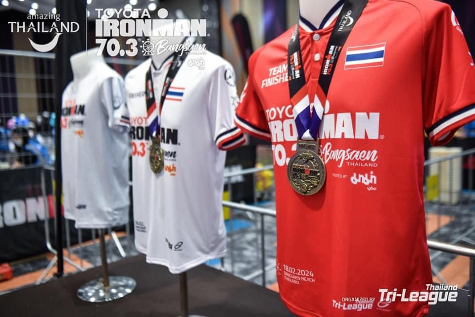 Custom finisher apparel and medals displayed at the event