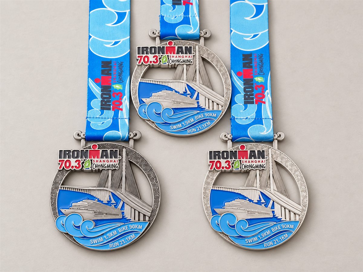 AI-styled presentation of three blue and silver finisher medals with ribbons