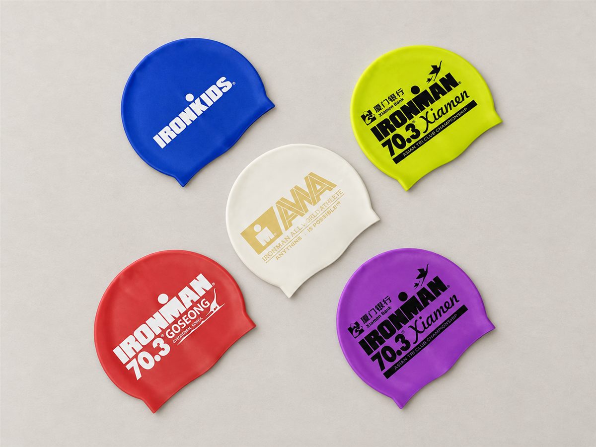 AI-styled presentation of five coloured printed swim caps